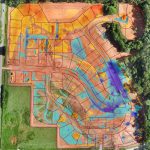 Assessing cut (red) and fill (blue) on a construction site using drone surveying.